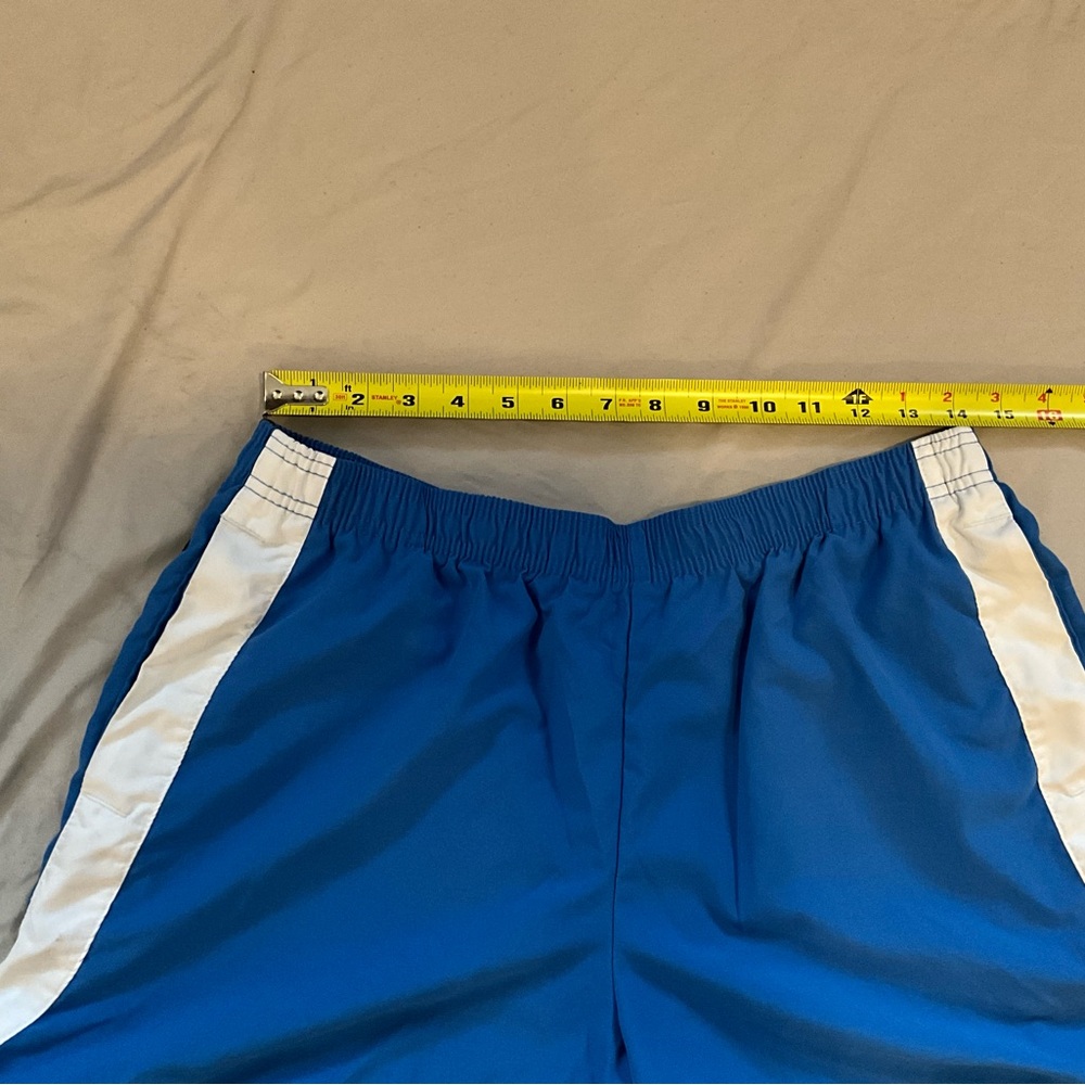 Blue Nike Athletic Shorts with White Stripes